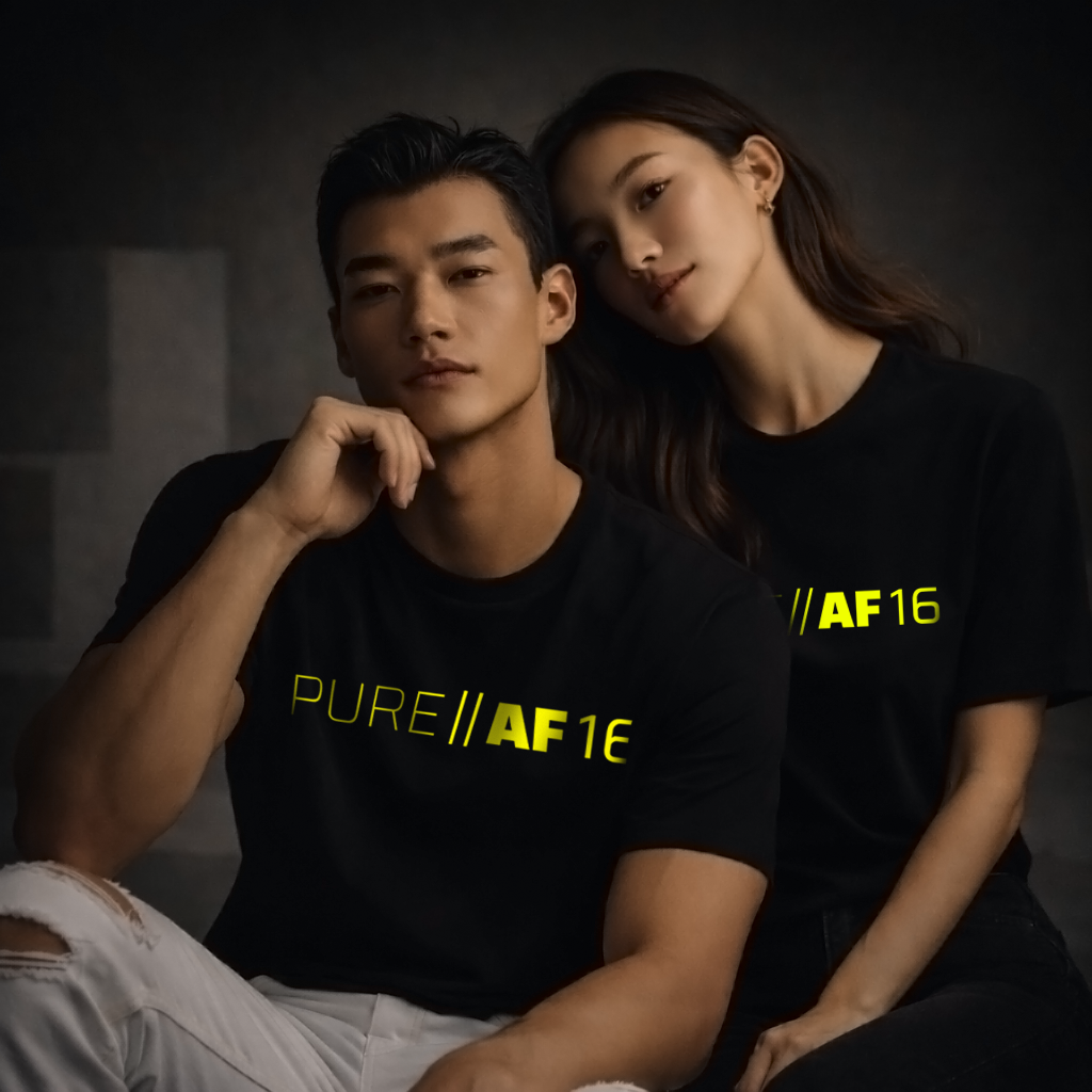 Two people wearing black t-shirts with 'PURE||AF16' yellow glow printed vinyl.